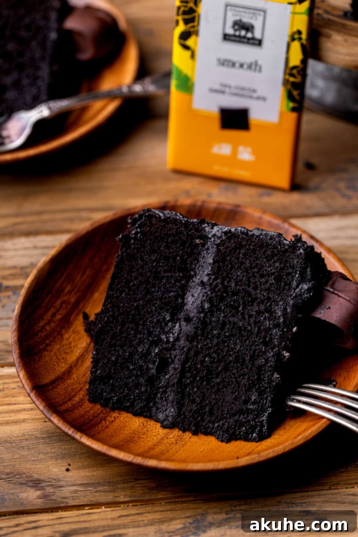 Bewitching Halloween Chocolate Cake 12 The full Halloween chocolate cake, beautifully decorated and ready to be served, resting on a clean white plate.