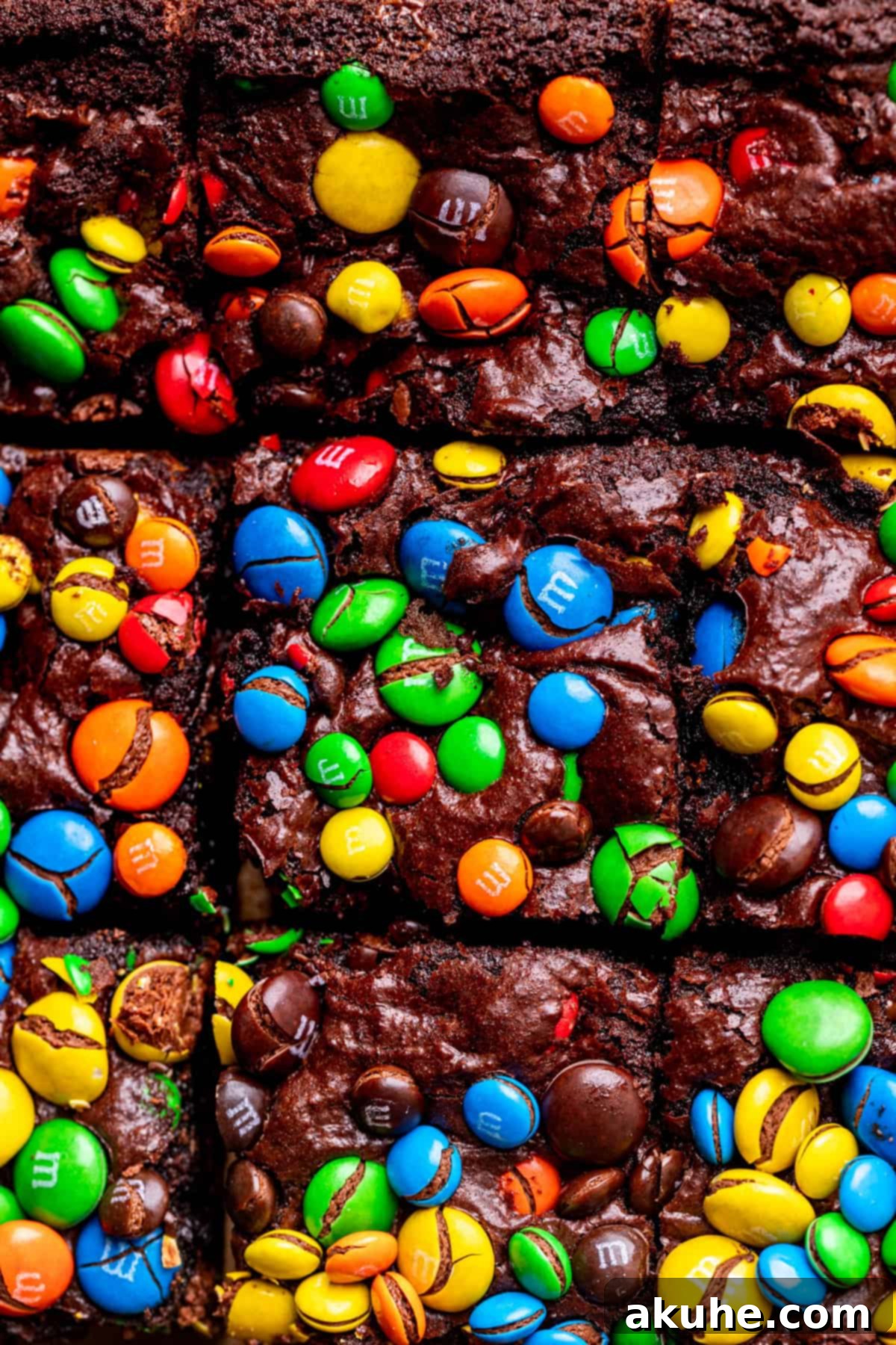 Decadent Fudgy M and M Brownies 8 An overhead shot of freshly baked M&M brownies, showing the delightful scattering of colorful candies on top.