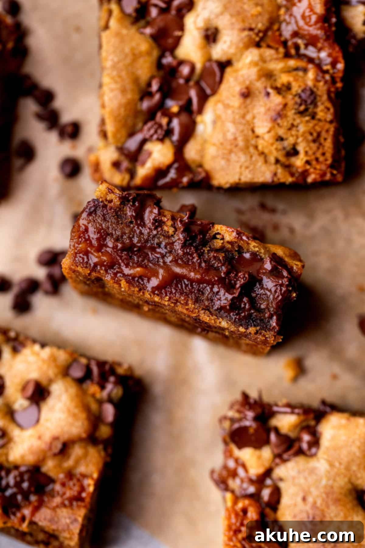 Decadent Caramel Cookie Bars 3 A single caramel cookie bar, perfectly cut to reveal its distinct layers of cookie and caramel.