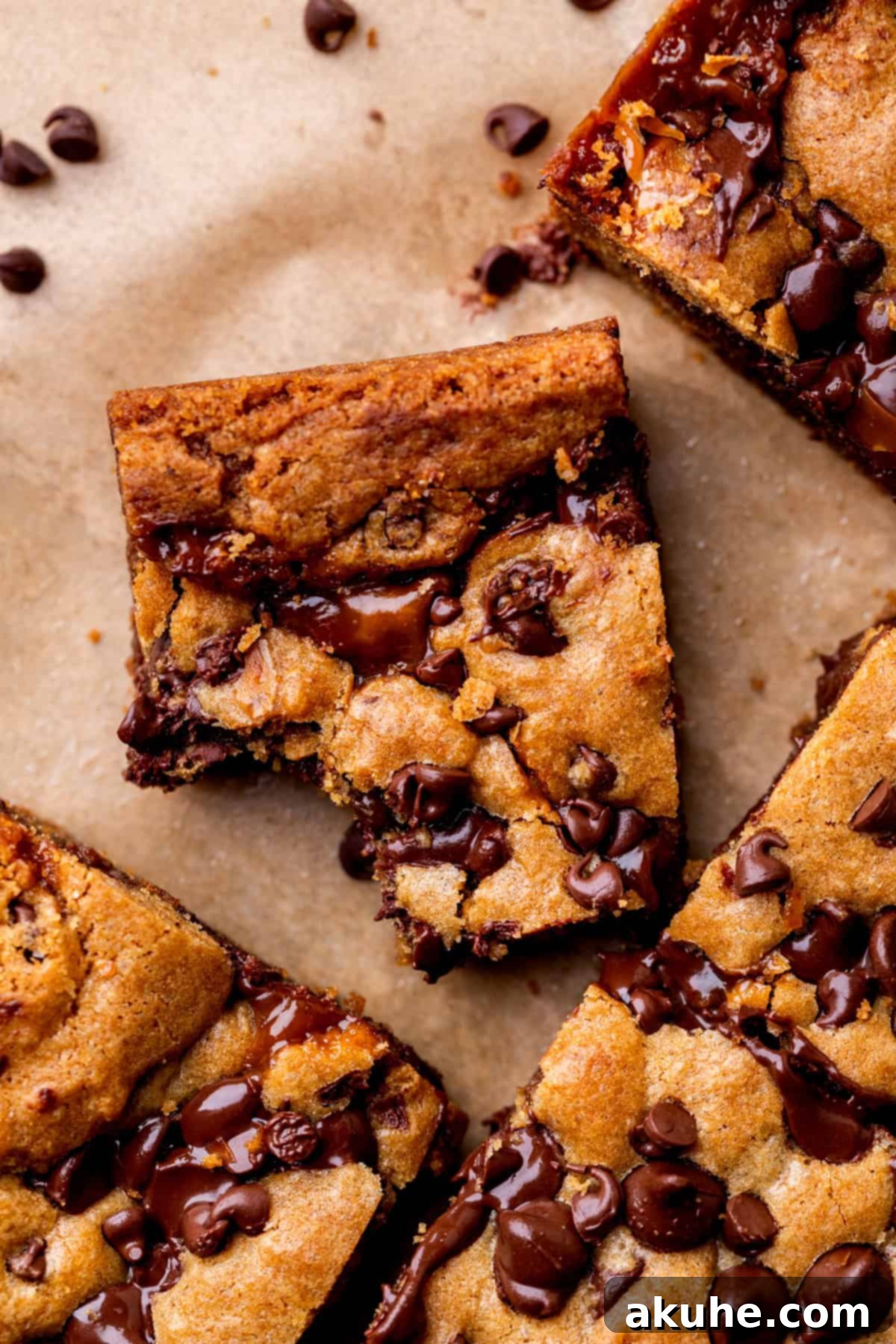 Decadent Caramel Cookie Bars 10 A caramel cookie bar with a bite taken out, showcasing the perfect texture and filling.