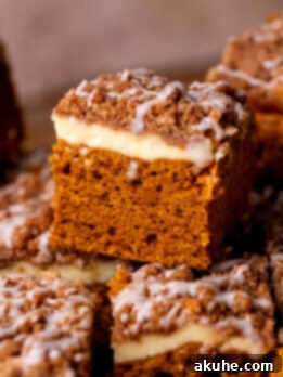 Autumn Pumpkin Streusel Cake 12 Close up of a slice of pumpkin coffee cake.