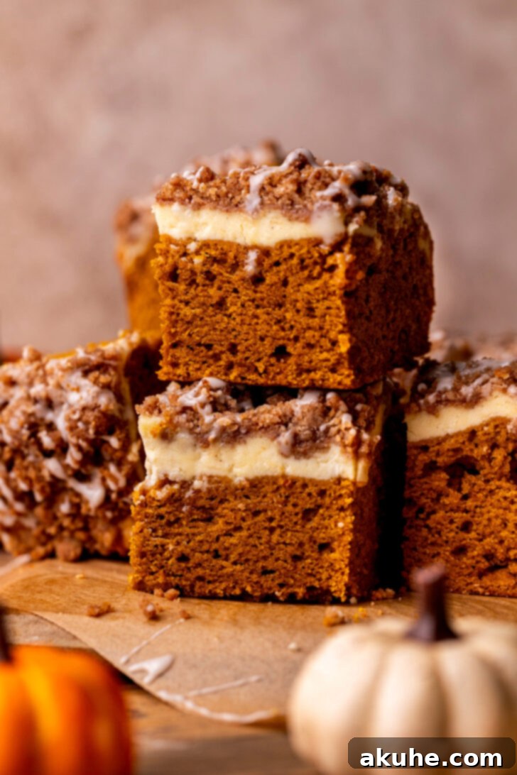Autumn Pumpkin Streusel Cake 10 Stack of two pumpkin coffee cake slices, showing the beautiful layers.