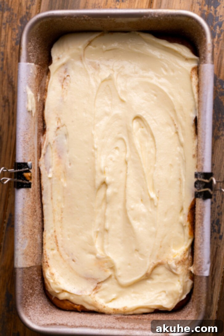 Cream Cheese Swirled Pumpkin Bread 6 Evenly spread cream cheese layer over the pumpkin batter in the loaf pan.