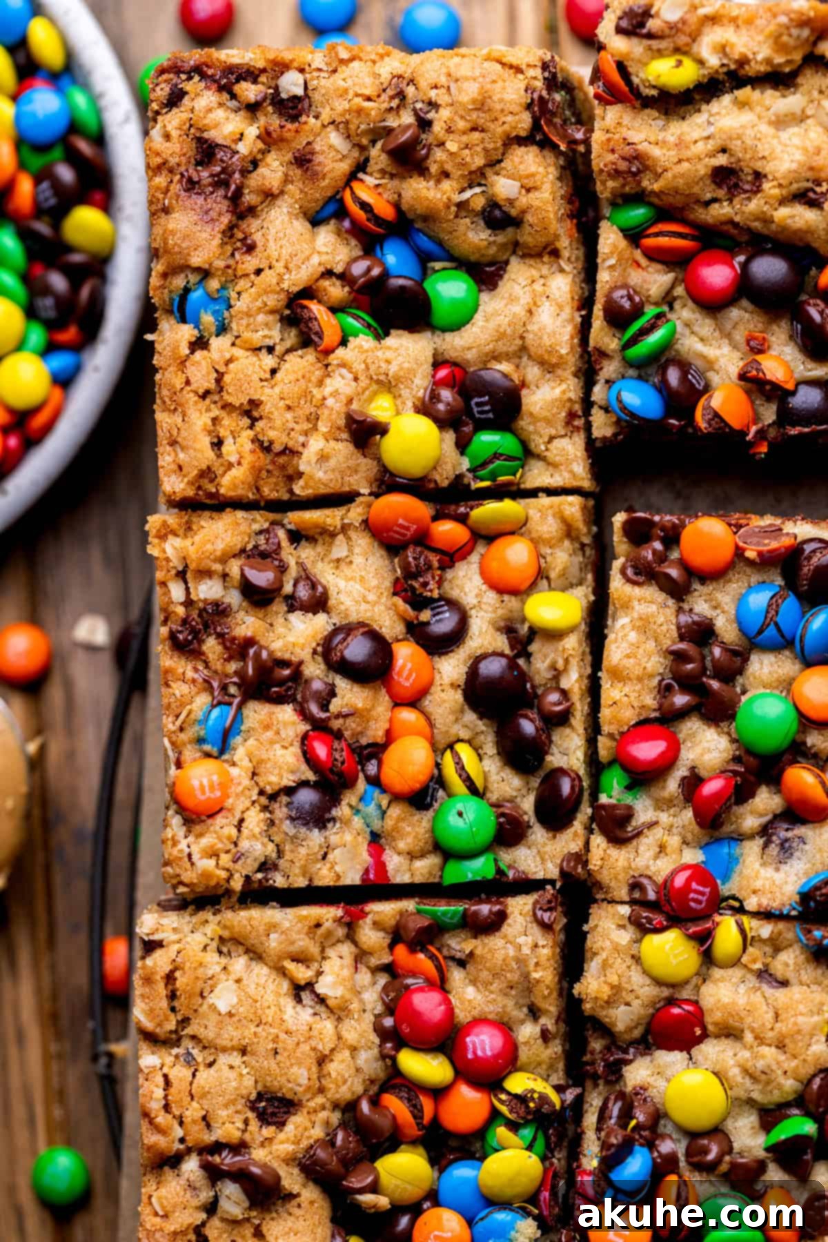 Ultimate Monster Cookie Bars 3 An overhead shot of freshly baked monster cookie bars, perfectly cut into neat squares and ready to serve.