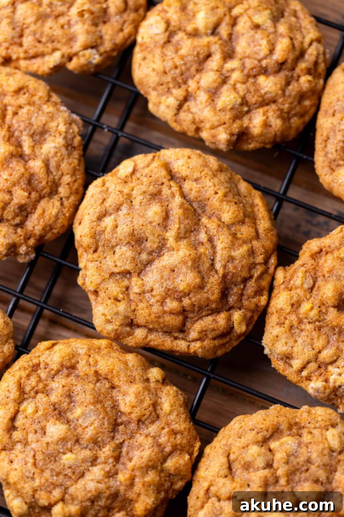 Spiced Pumpkin Oatmeal Cream Pies 6 Freshly baked pumpkin oatmeal cookies cooling on a wire rack, perfectly round and ready for filling.