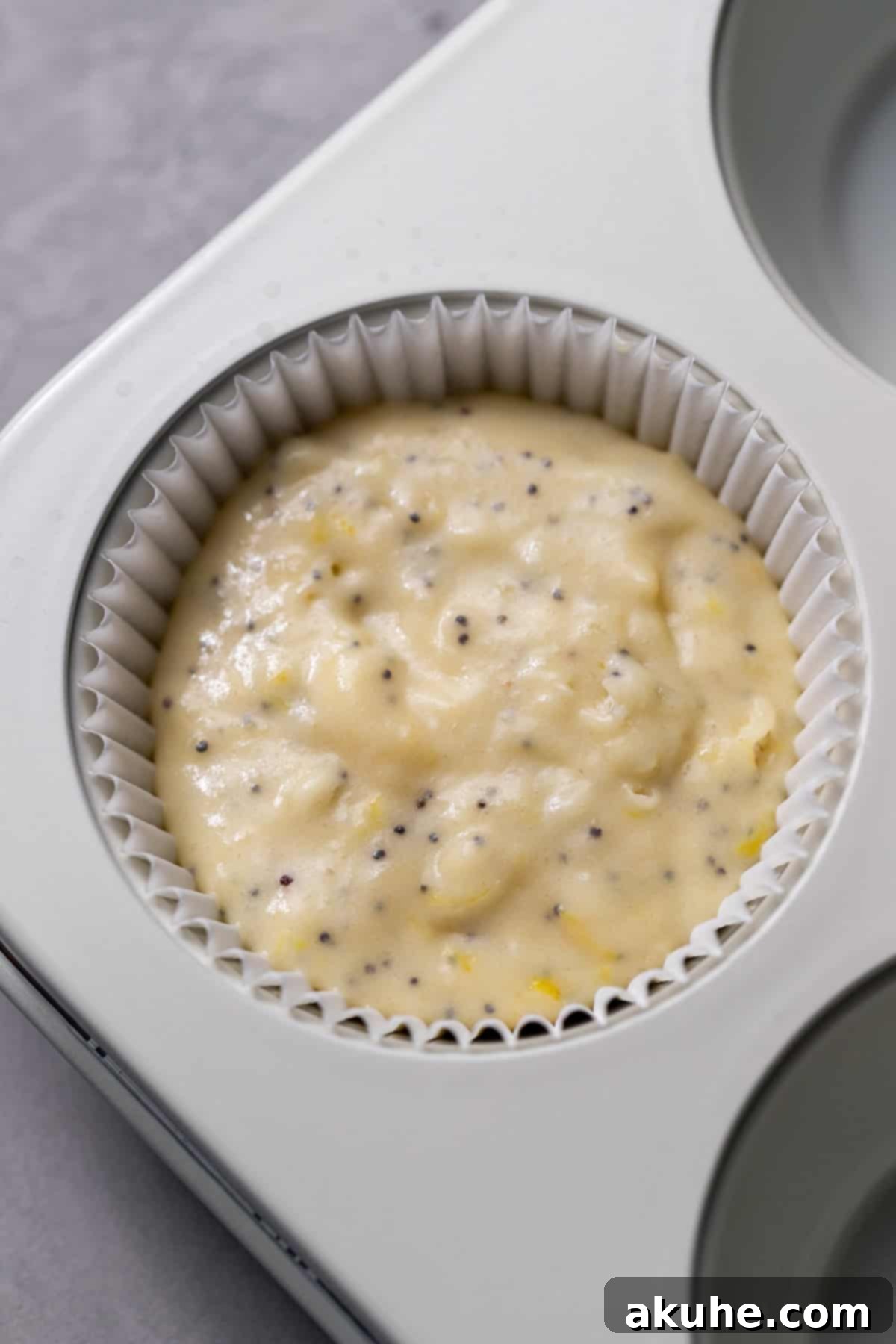 Zesty Cream Cheese Muffin Perfection 7 Muffin batter in pan.