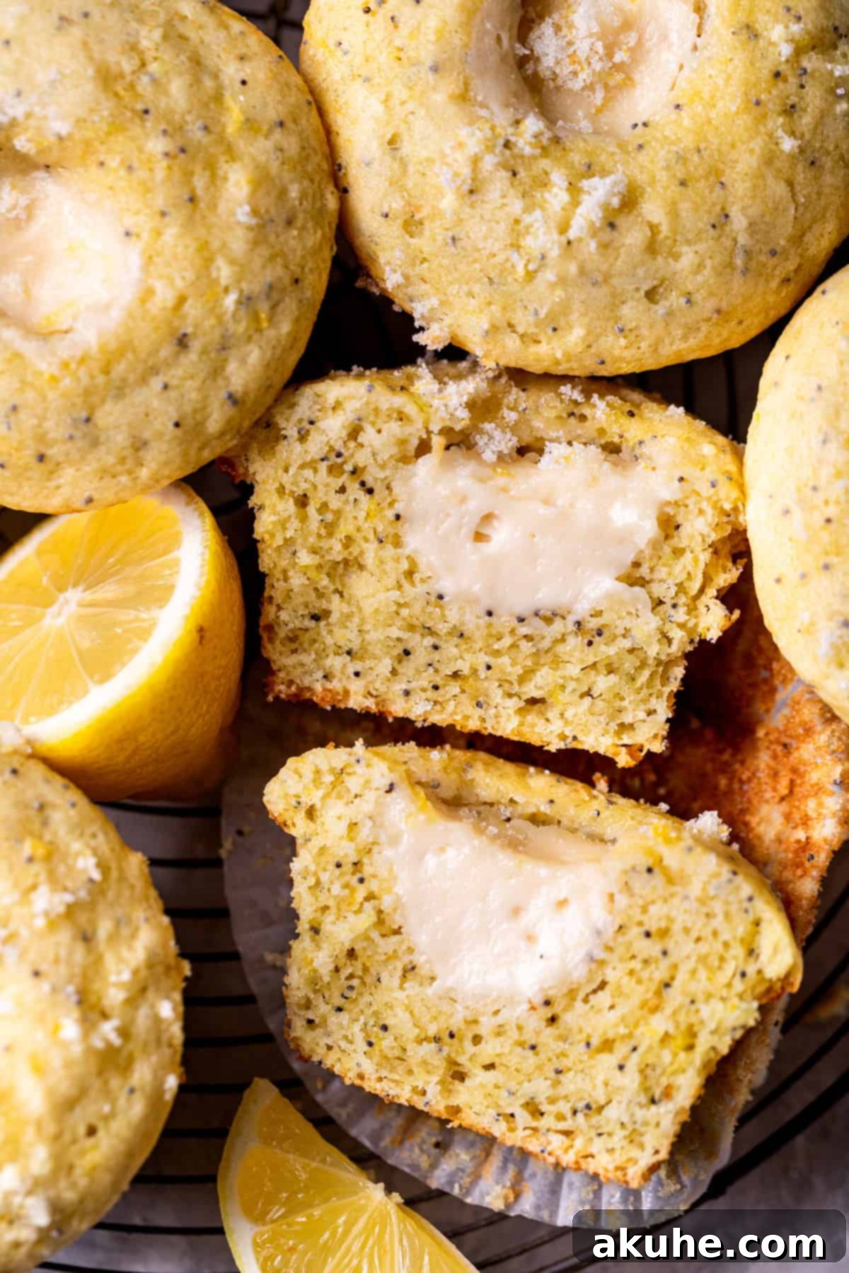Zesty Cream Cheese Muffin Perfection 10 One lemon cream cheese muffin cut in half.