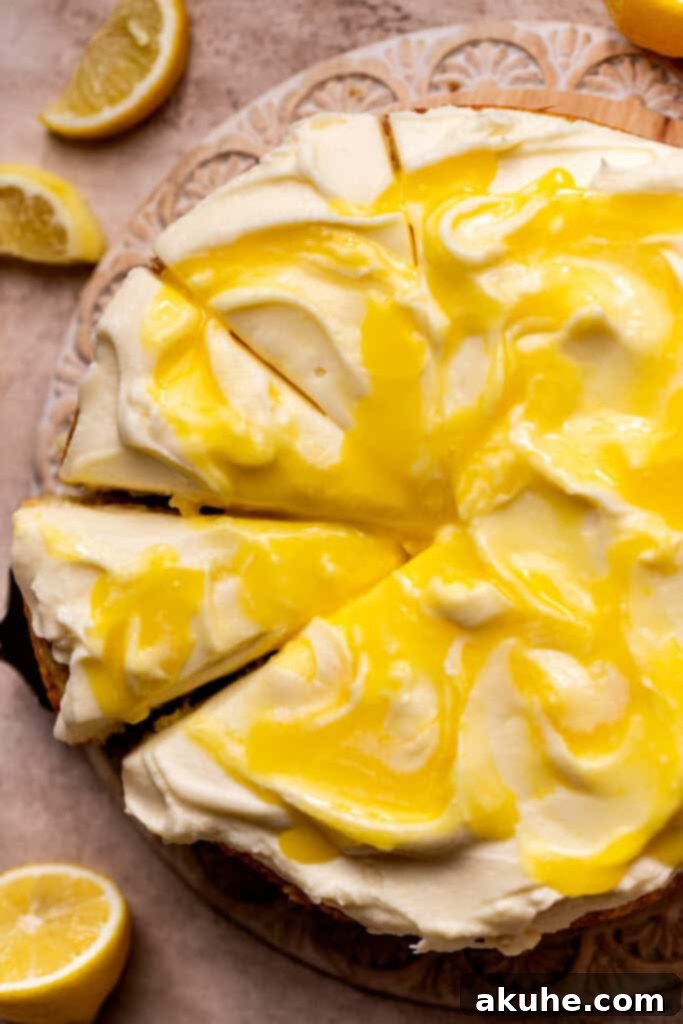 Top view of the lemon curd cake, showing the lemon curd swirled into the cream cheese frosting.