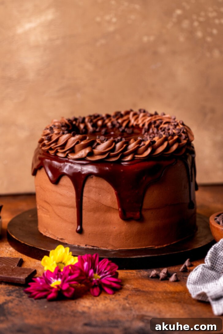 Luscious Chocolate Cream Cheese Frosting 7 Decorated cake on a wood board.