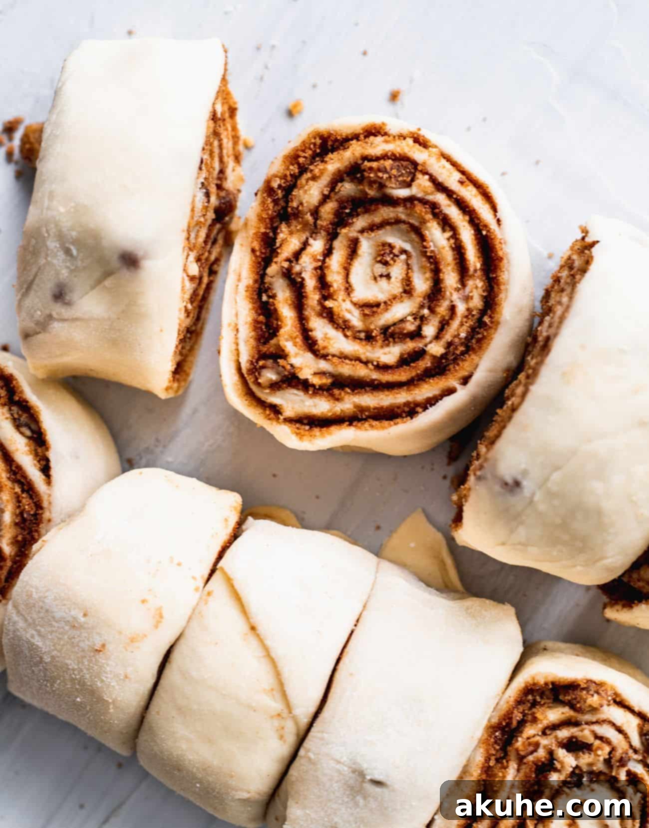 Nutty Cinnamon Swirls 8 Raw, rolled cinnamon roll dough, ready for cutting.