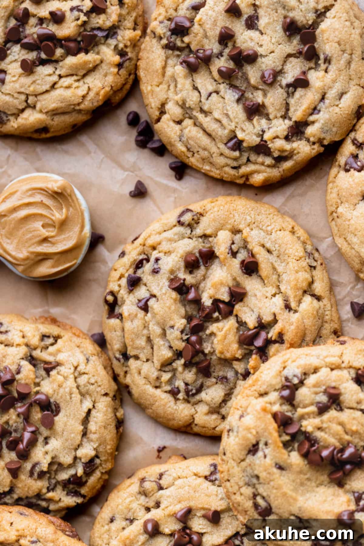Perfect Peanut Butter Chocolate Chip Cookies 2 Close up of peanut butter chocolate chip cookies, showcasing their chewy texture and abundance of mini chocolate chips.
