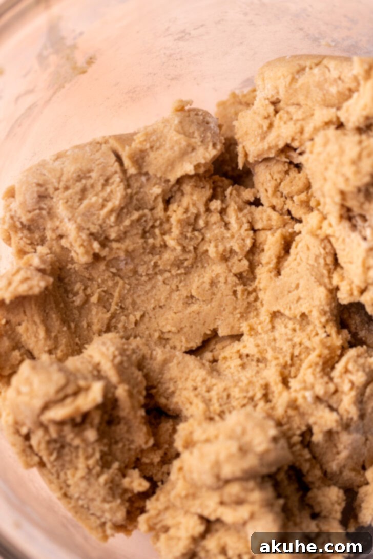 Delectable Peach Cobbler Cookies 5 Thick cookie dough in a mixing bowl.