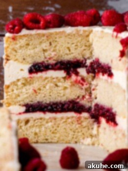 White chocolate raspberry cake close up.