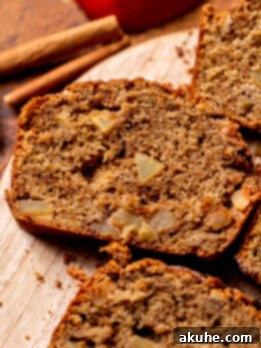 Spiced Apple Bread 10 Close up of one slice of apple bread.