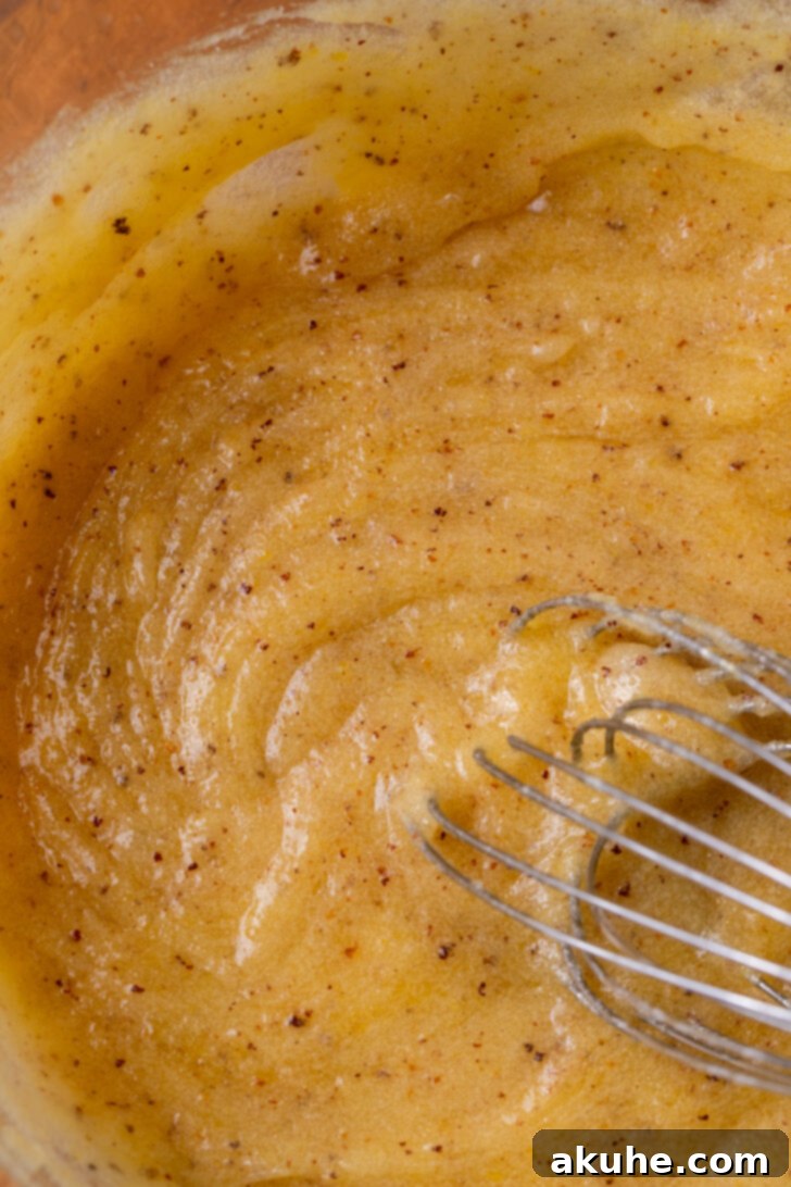 Spiced Chai Cookies 4 Wet ingredients including browned butter, sugar, eggs, and vanilla in a mixing bowl.