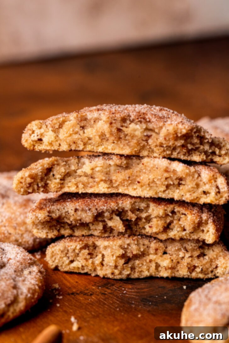 Spiced Chai Cookies 8 Twochai cookies, one split in half, stacked on a plate.