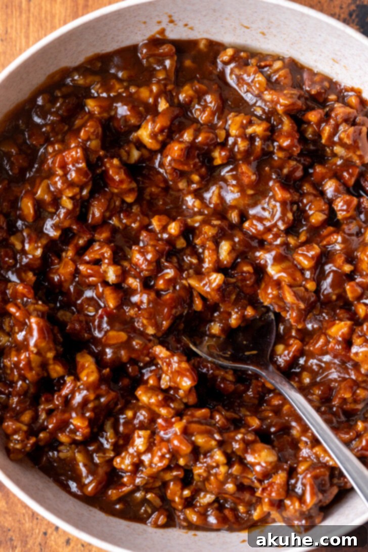 Decadent Pecan Pie Brownies 6 Pecan pie filling in a bowl.