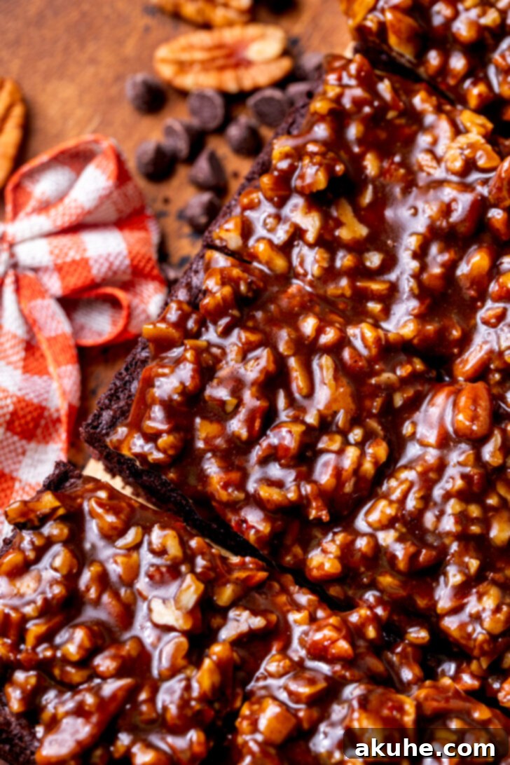 Decadent Pecan Pie Brownies 7 Top view of brownies with filling on top.