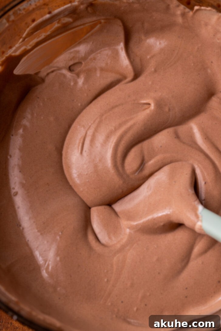 Deep South Chocolate Decadence 6 Smooth chocolate pudding in a mixing bowl.