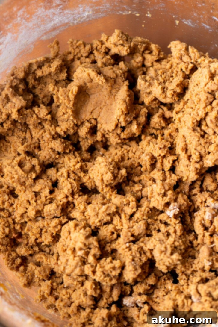 Irresistibly Soft Gingerbread 5 Thick gingerbread cookie dough in a bowl, resembling modeling clay.