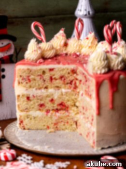 White chocolate peppermint cake opened up on a platter.