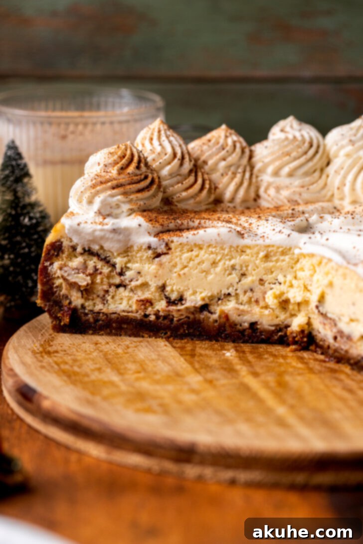 Eggnog Dream Cheesecake 3 Side view of opened cheesecake.