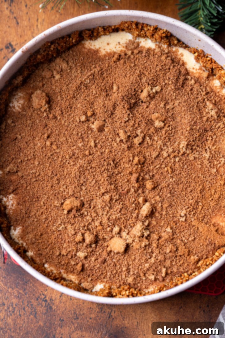 Eggnog Dream Cheesecake 5 Cinnamon filling on top of batter.