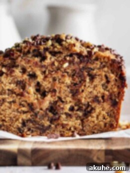 Ultimate Chocolate Walnut Banana Bread 9 Side view of walnut chocolate chip banana bread.