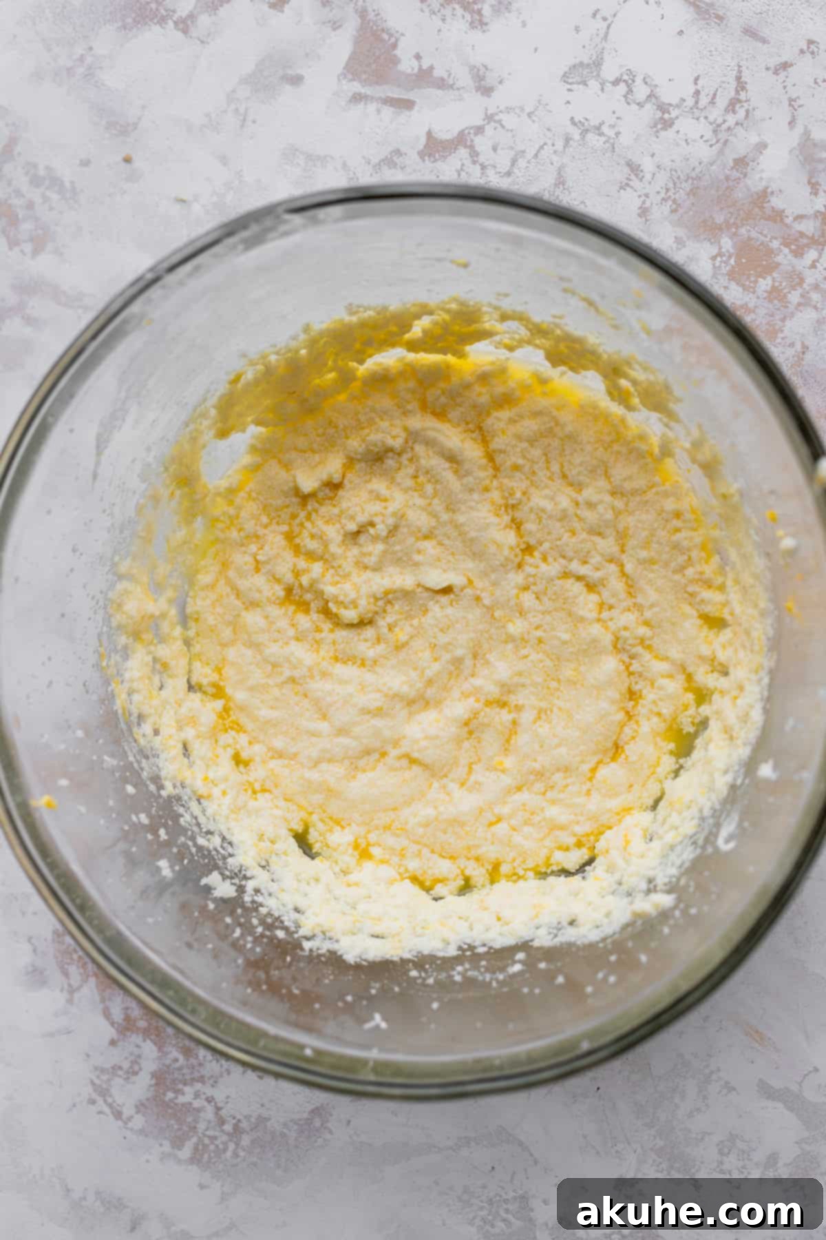 Sunshine Lemon Poppy Seed Cupcakes 4 Bowl of wet ingredients for lemon poppy seed cupcakes, showing the creamy texture.