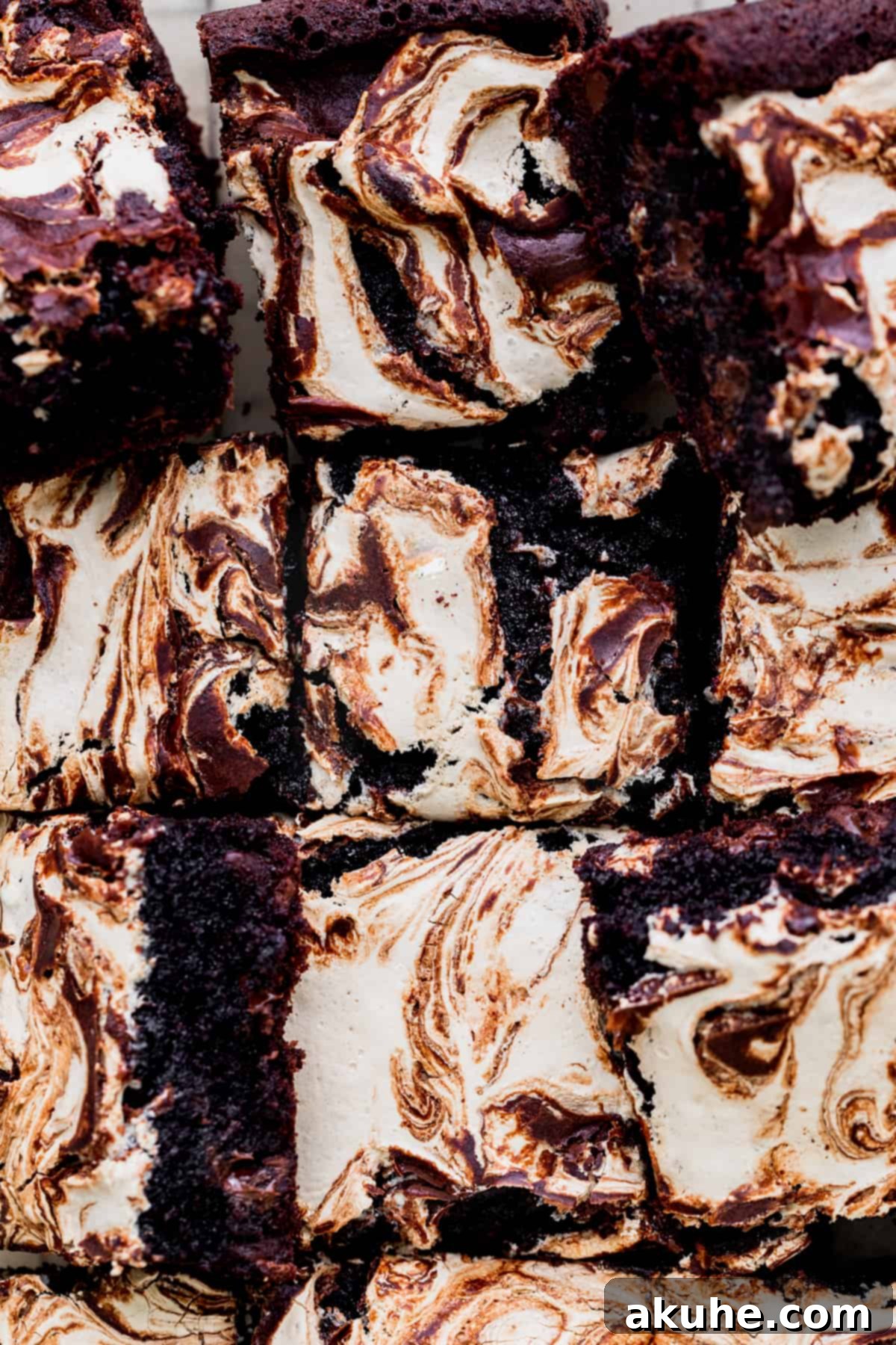 Decadent Marshmallow Brownies 3 A close-up shot of the rich, fudgy interior of a marshmallow brownie, highlighting its dense texture and chocolate chips.