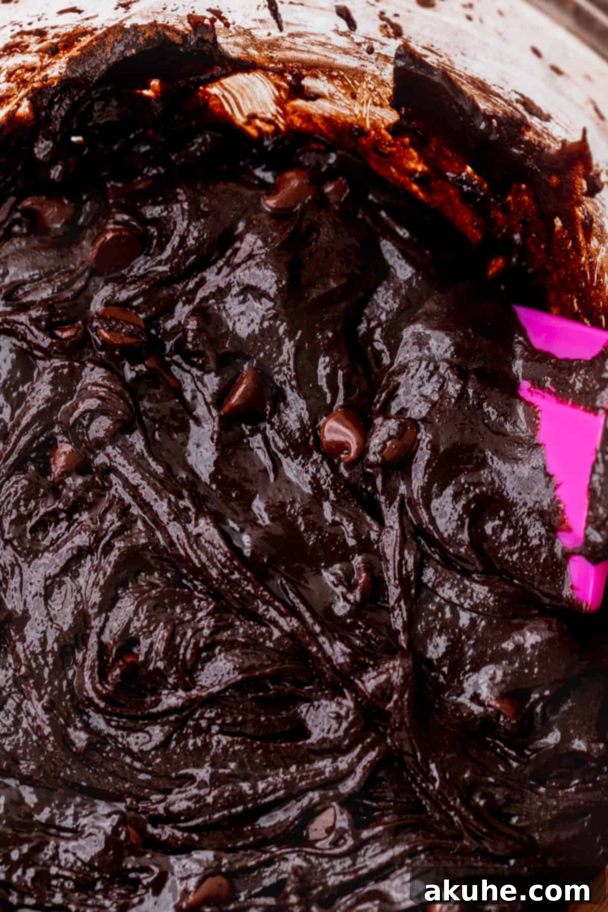 Decadent Marshmallow Brownies 6 Close-up of brownie batter spread evenly in a prepared baking pan.