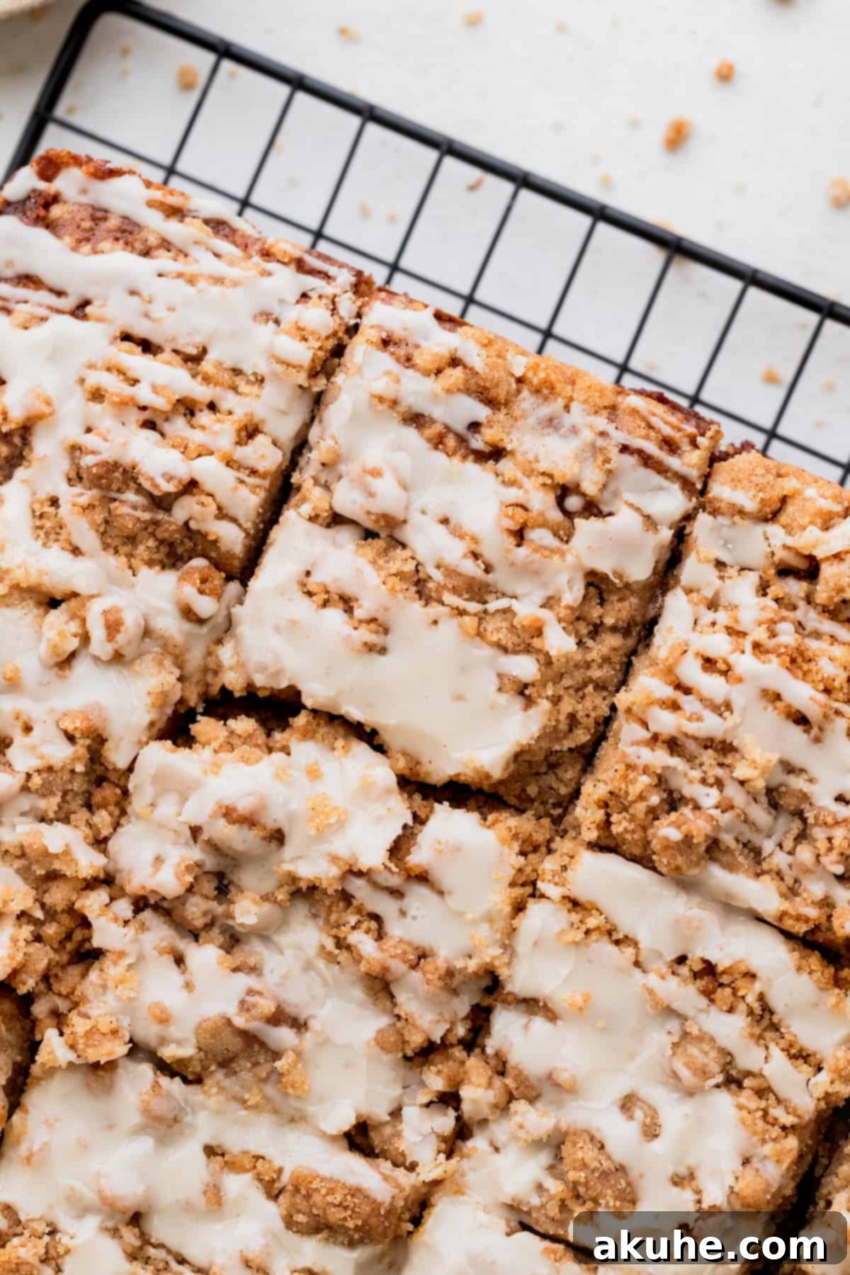Banana Bread Streusel Coffee Cake 13 Banana bread coffee cake with glaze on top.