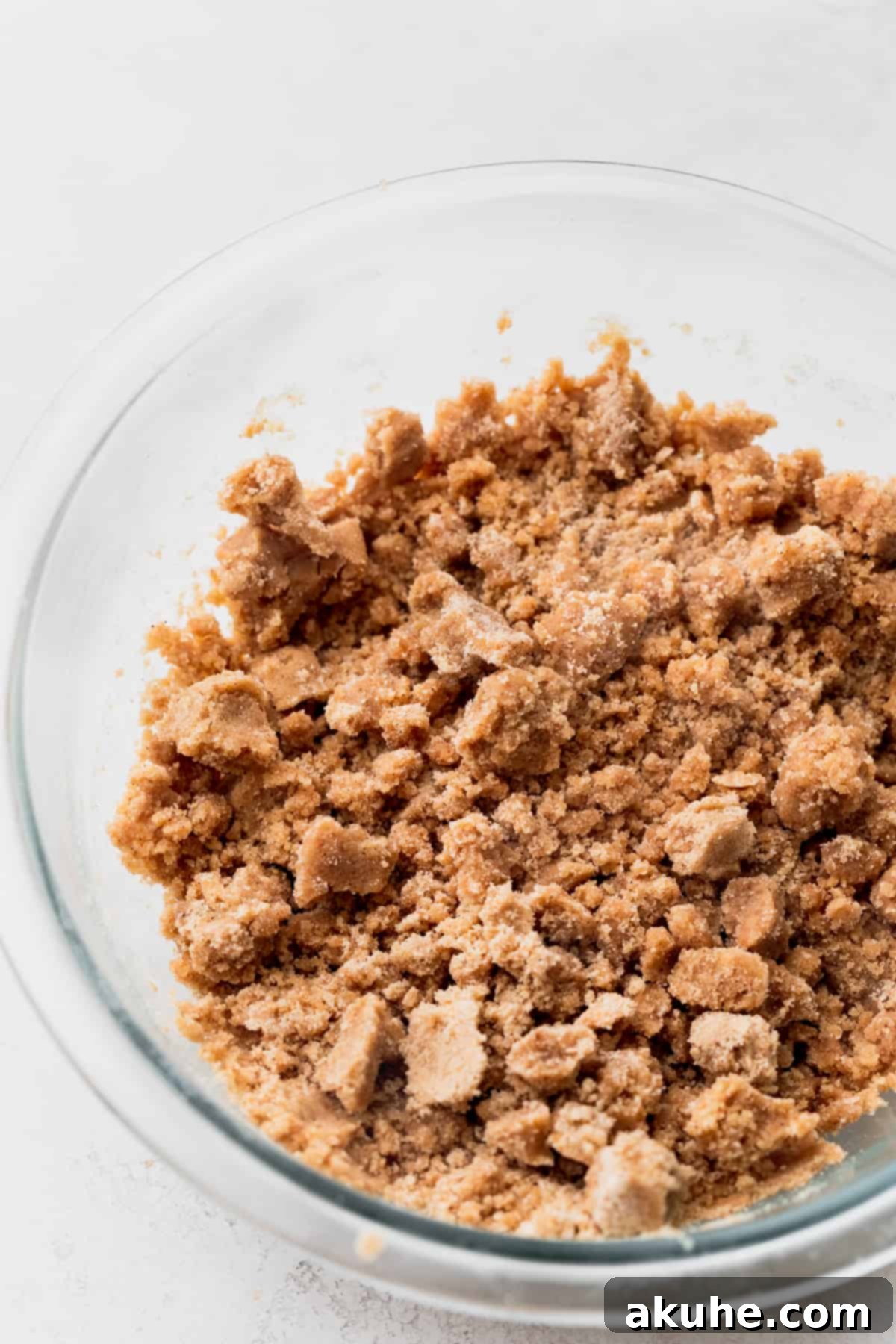 Banana Bread Streusel Coffee Cake 4 Cinnamon streusel in a glass bowl.