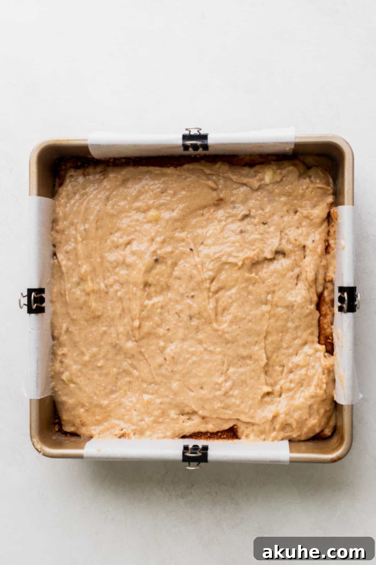 Banana Bread Streusel Coffee Cake 8 Banana batter in a pan.