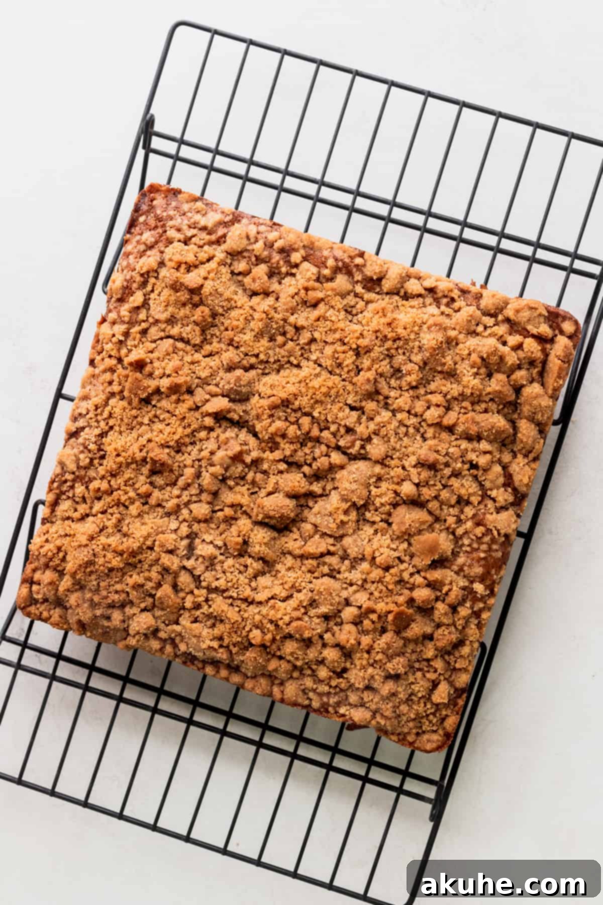 Banana Bread Streusel Coffee Cake 10 Baked coffee cake on a wire rack.