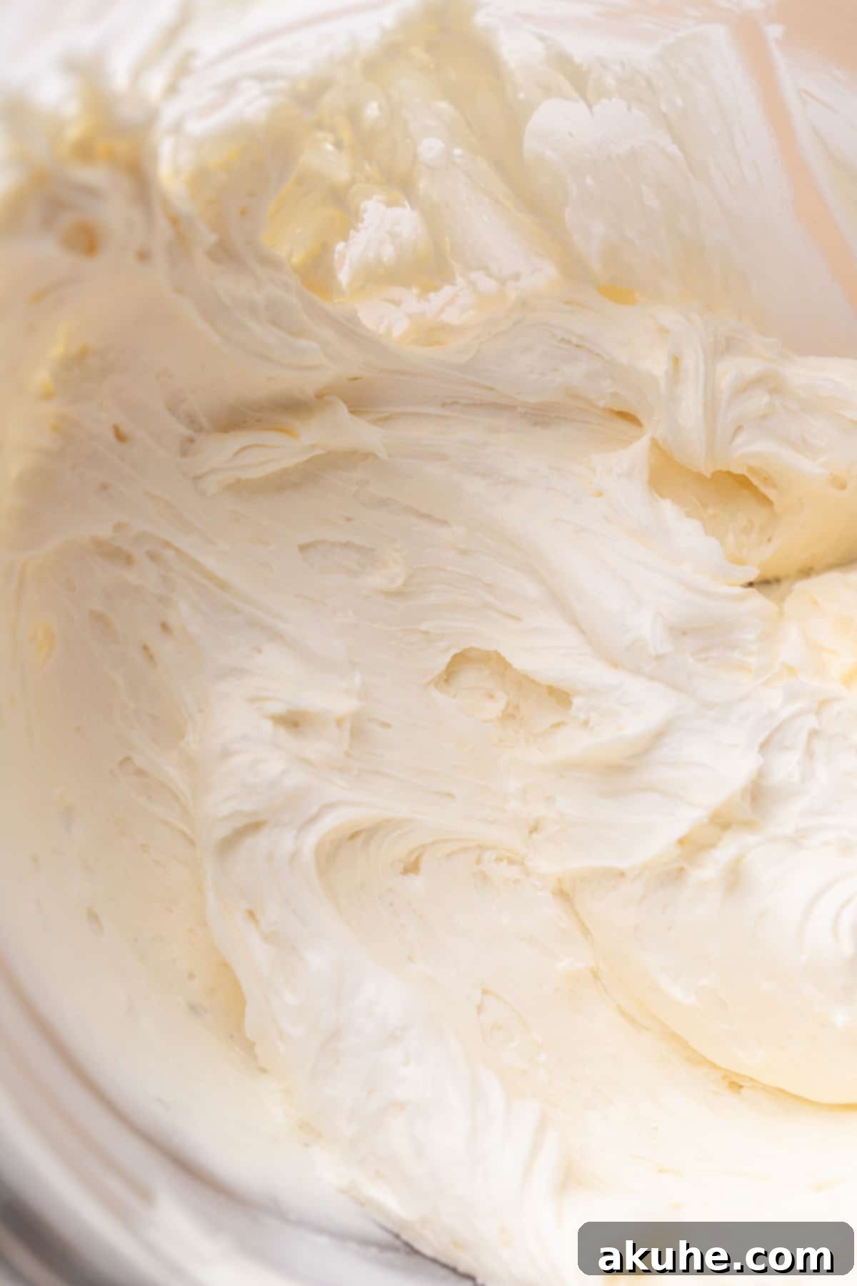 Classic Oatmeal Cream Cookies 8 Close-up of fluffy marshmallow cream filling in a clear glass bowl.