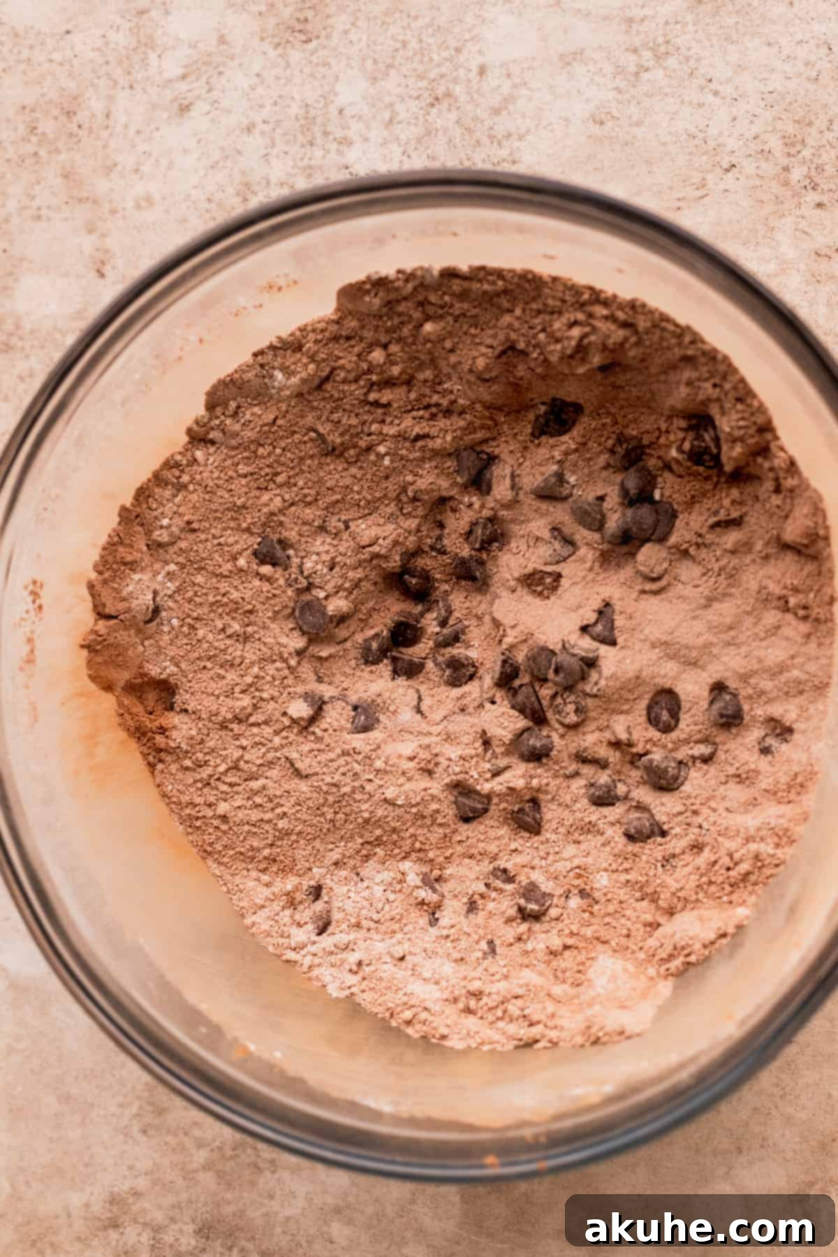 Decadent Triple Chocolate Muffins 4 Dry ingredients in a glass bowl.