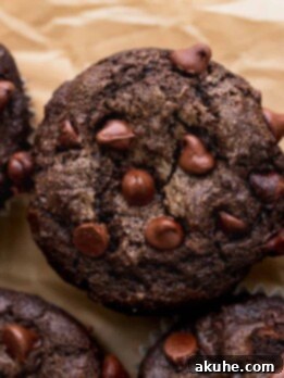 Decadent Triple Chocolate Muffins 10 Top view of triple chocolate muffins.