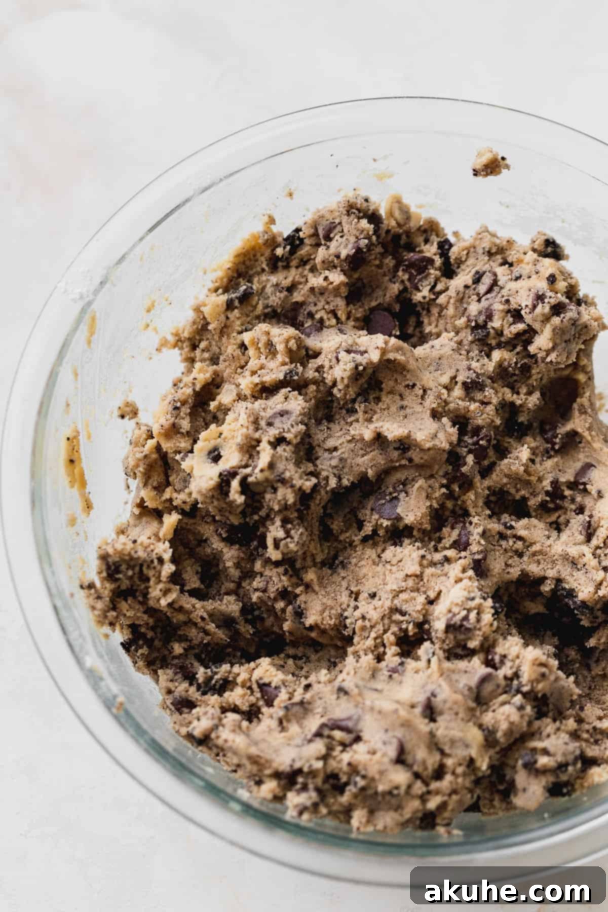 Decadent Oreo Chocolate Chip Cookies 5 Cookie dough in a glass bowl, ready for chilling.