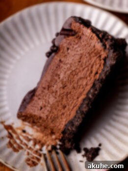 Top view of a slice of no-bake chocolate cheesecake, beautifully plated.