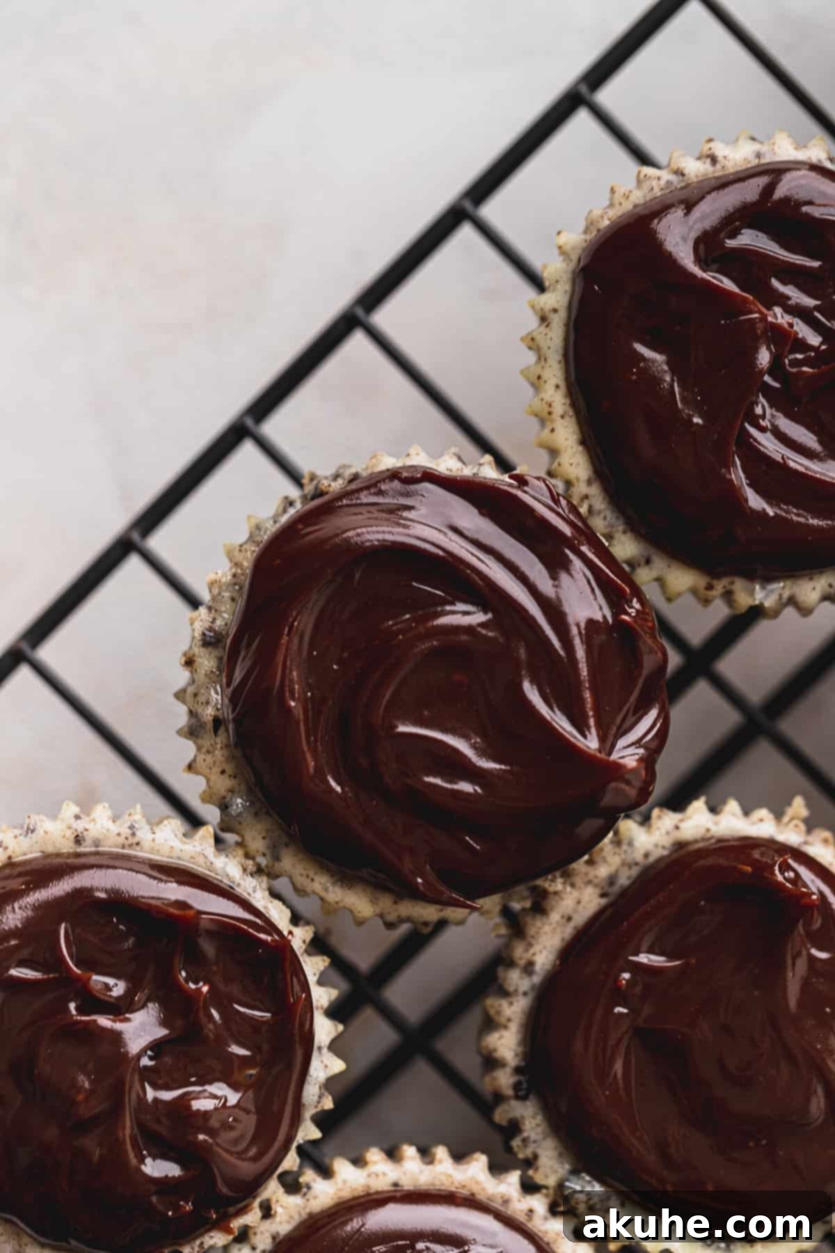Bite-Sized Oreo Cheesecakes 7 Hot fudge drizzled generously on top of mini cheesecakes.