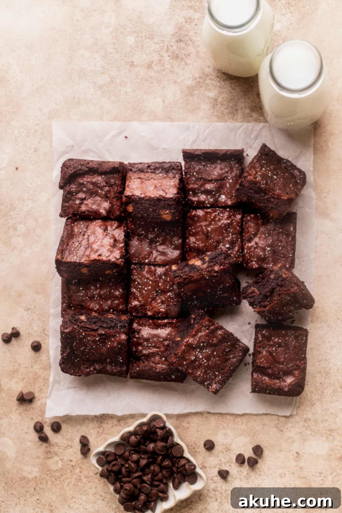 Forget the Box Ultimate Homemade Brownies 3 Cut brownies on a parchment paper.
