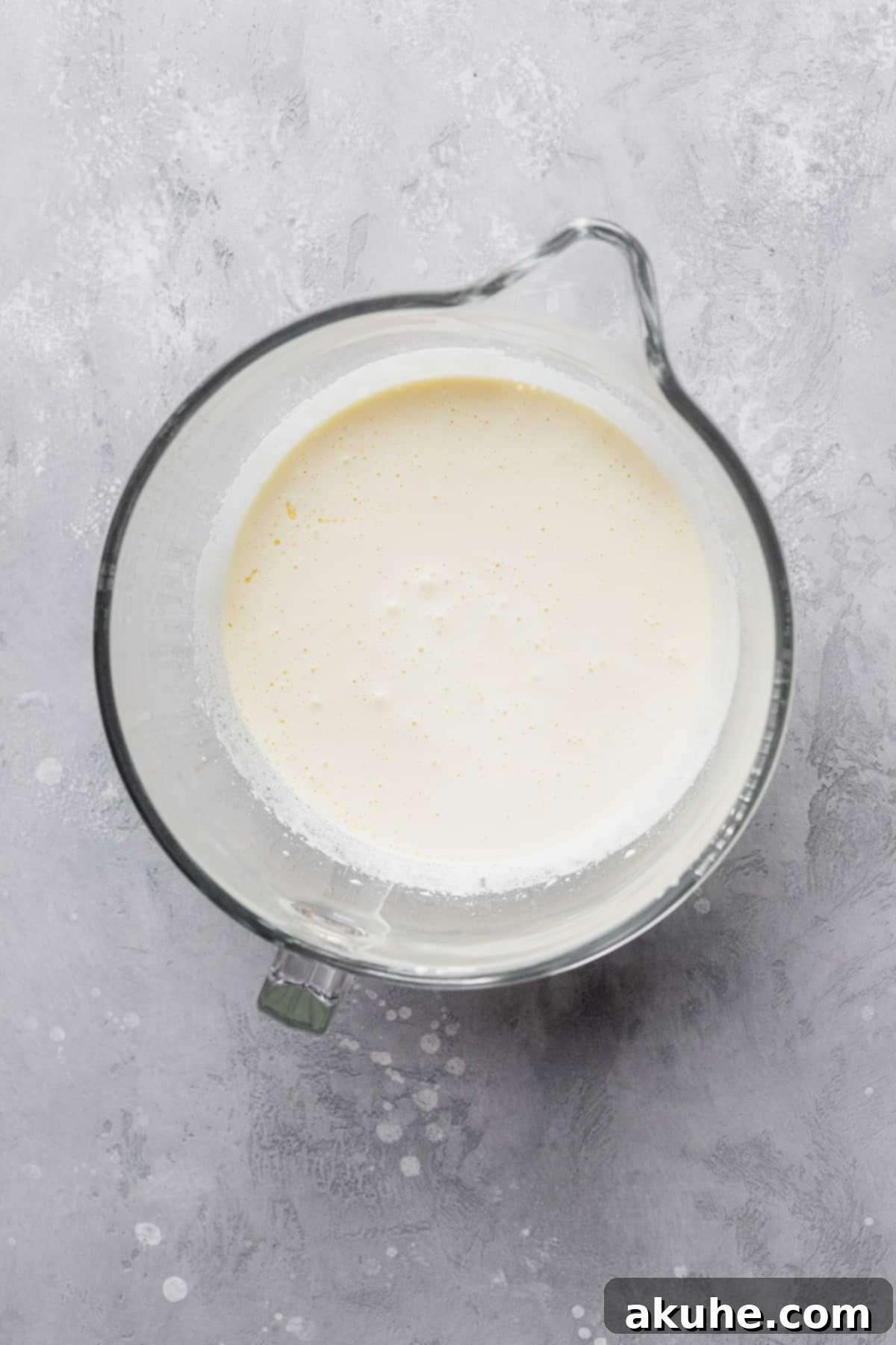 Forget the Box Ultimate Homemade Brownies 5 Whipped sugar in a glass bowl.