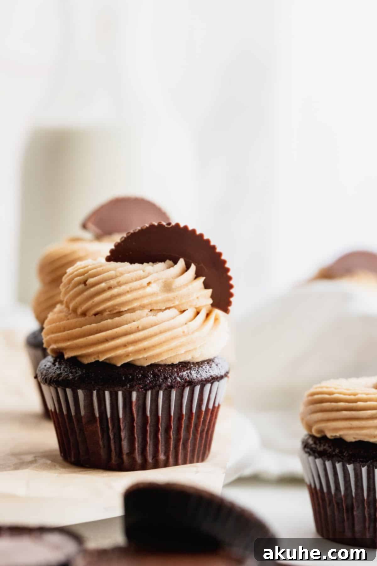 Peanut butter chocolate cupcakes on a platter.