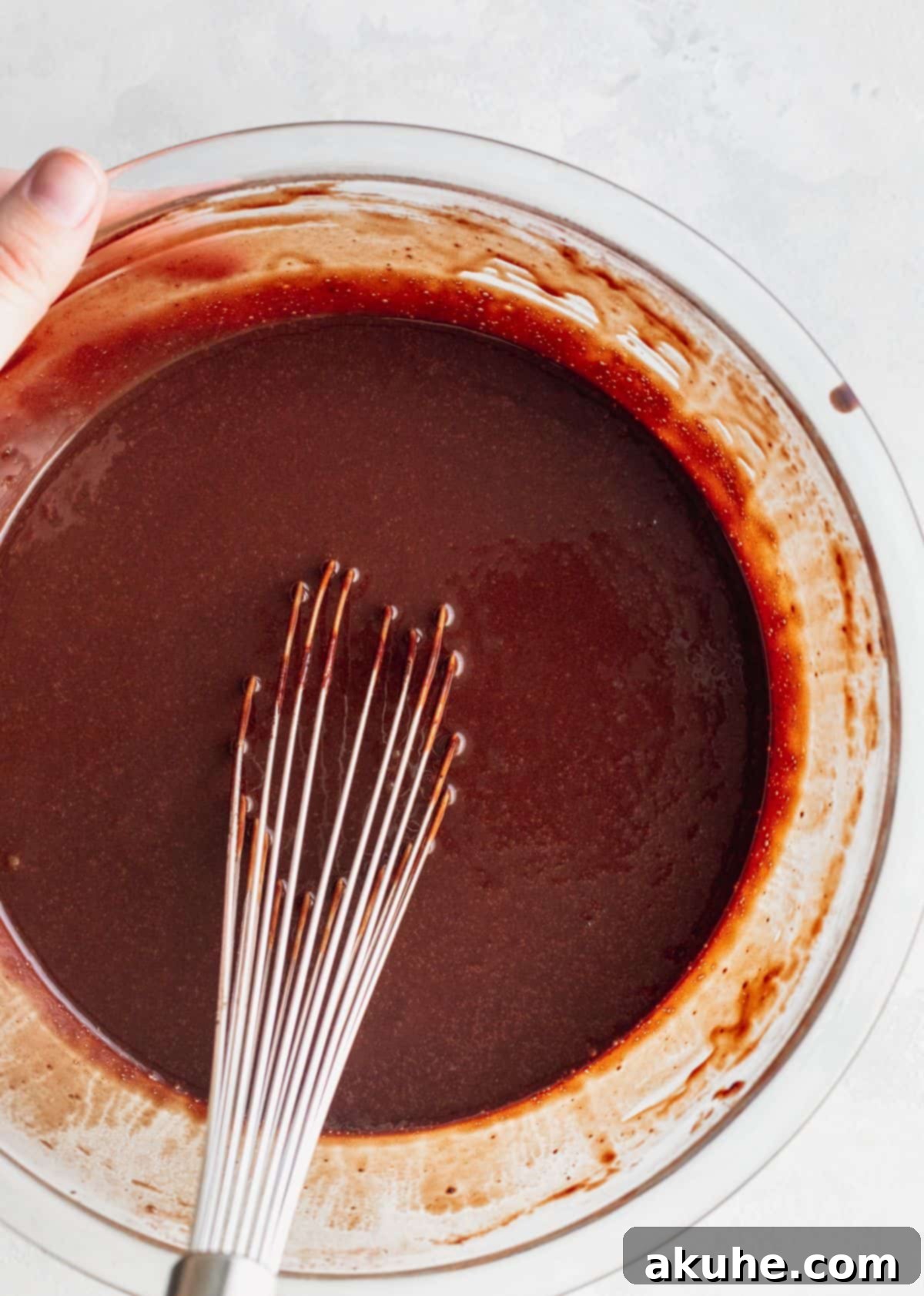 Cake batter in a glass bowl.