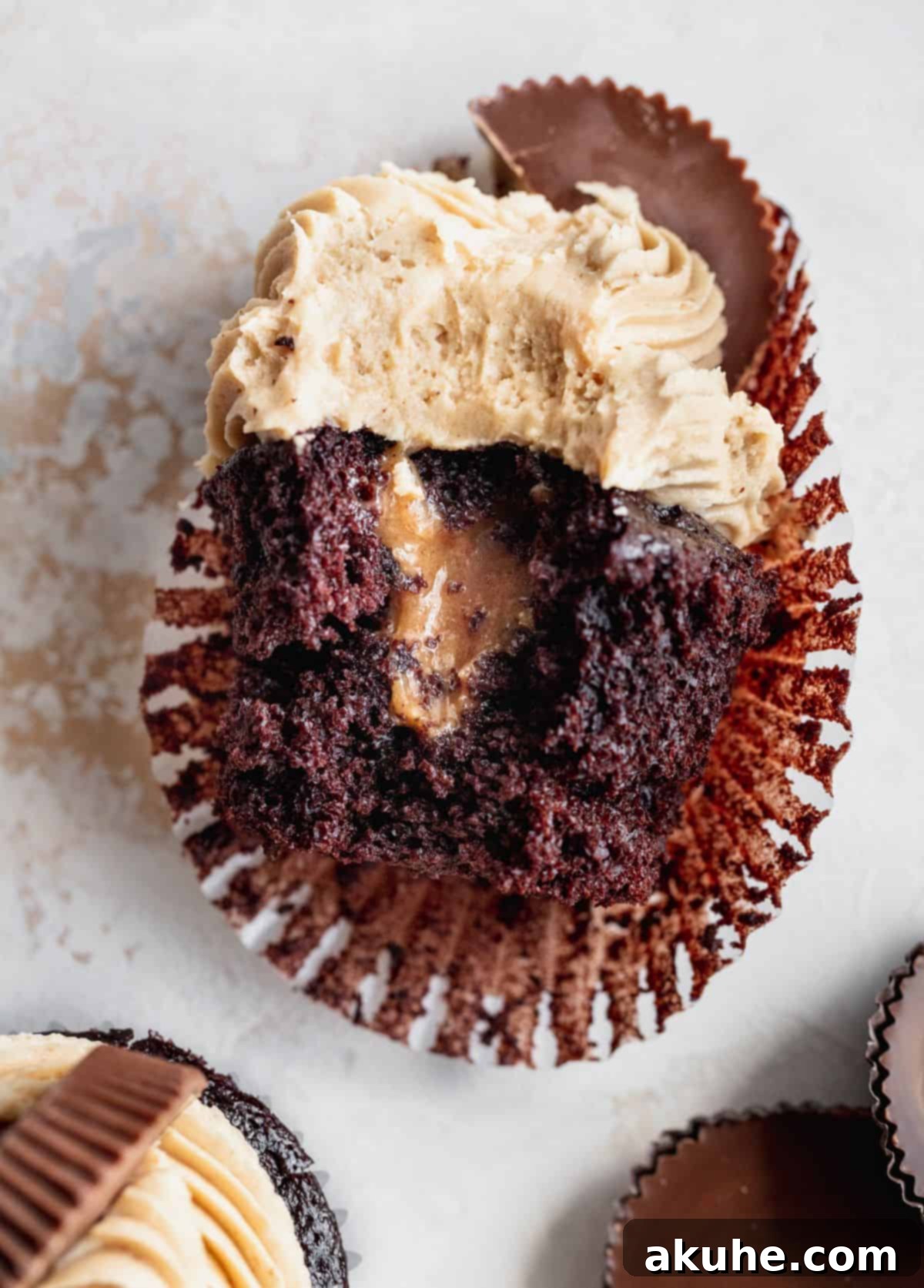 Bite missing from cupcakes.