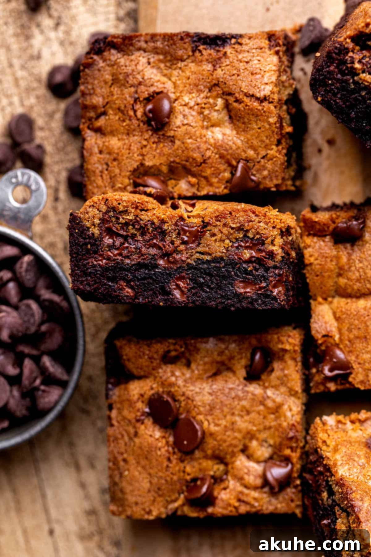 Hybrid Water Jewels 3 Close-up of a single brookie bar on its side, showing the brownie and cookie layers.
