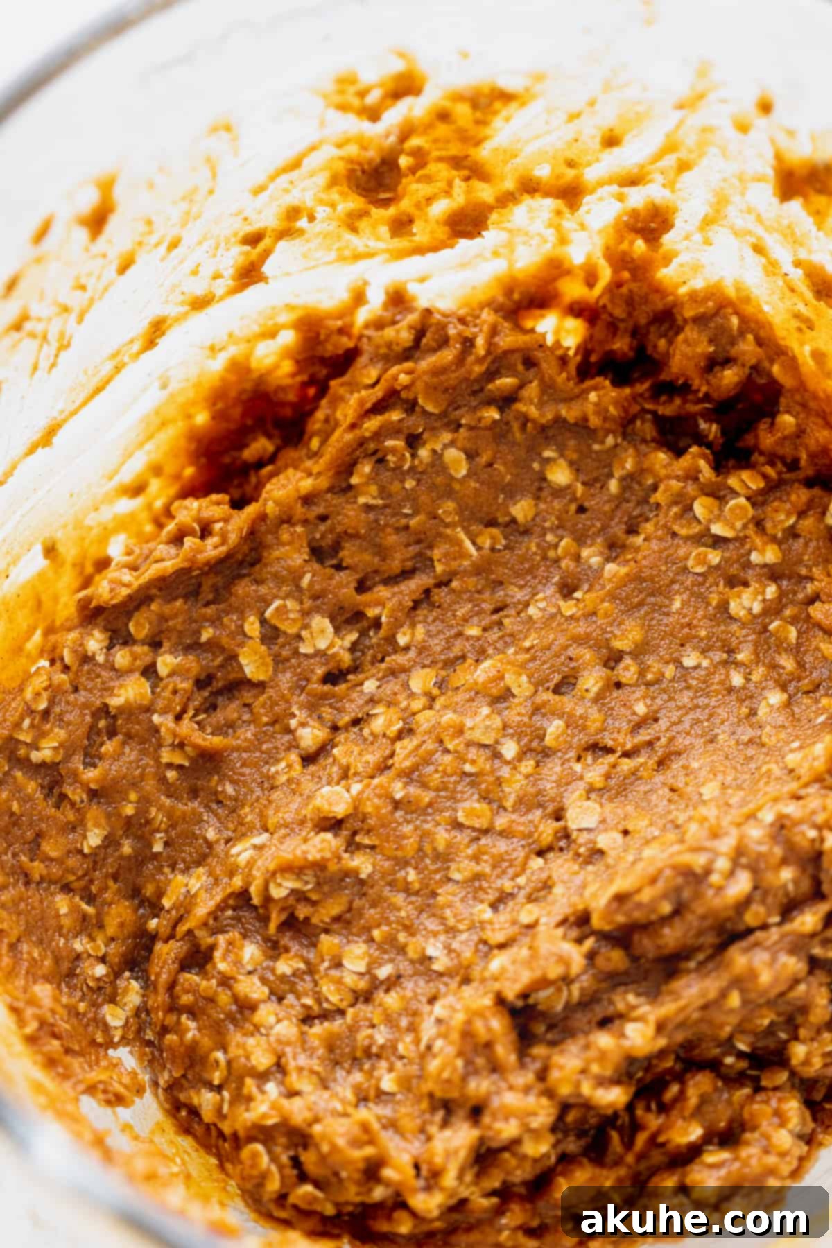 Prepared cookie dough in a glass bowl.