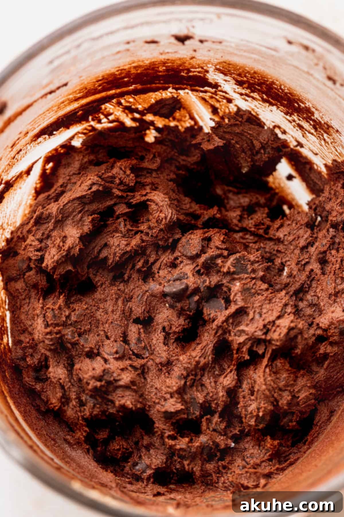 Peanut Butter Stuffed Chocolate Cookies 5 Chocolate cookie dough in a glass bowl.