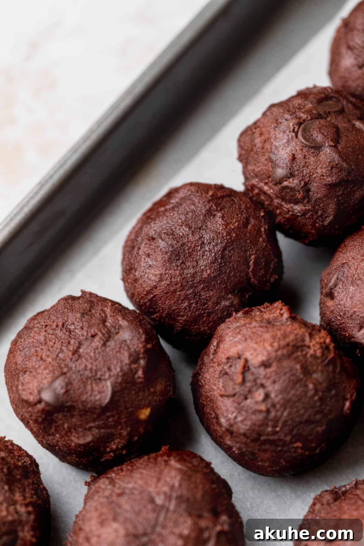 Peanut Butter Stuffed Chocolate Cookies 7 Rolled cookie dough on a cookie sheet.